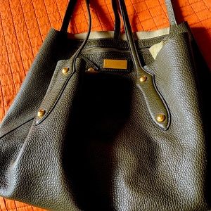 Annabelle Ingall green leather purse with brass